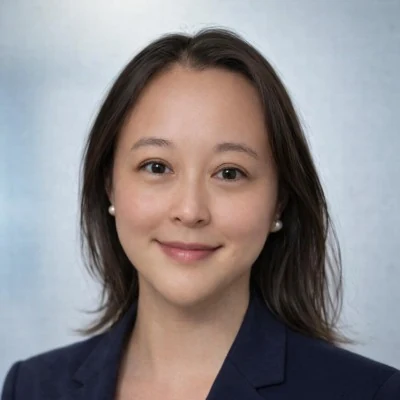 Generated portrait of Cynthia Jiang in a dark blazer against a plain background